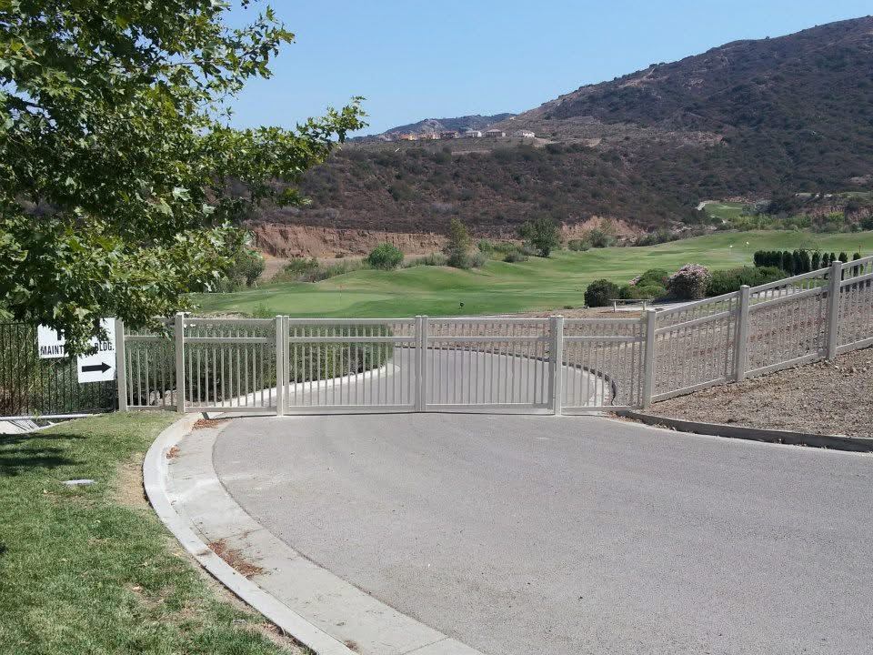 Vinyl picket gate at a community entrance